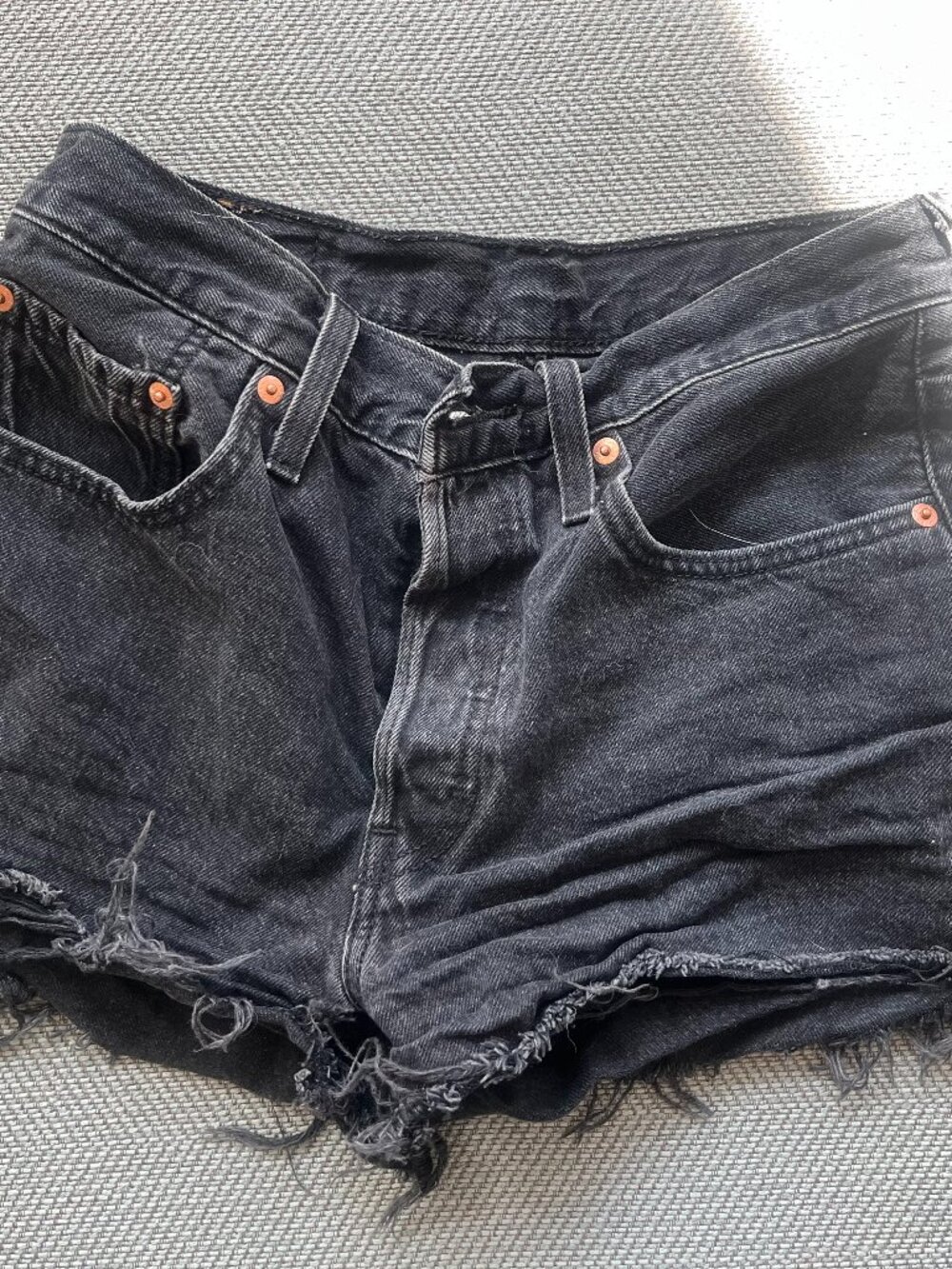 Levi's shorts: distressed black denim